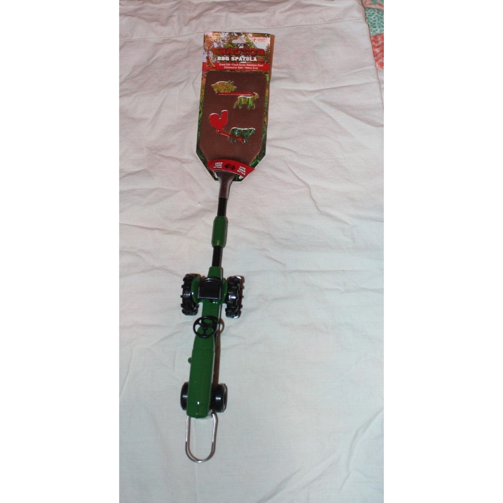 GIBSON TRACTOR BARBECUE SPATULA- HAS BOTTLE OPENER AND MAKES DESIGNS IN BURGER